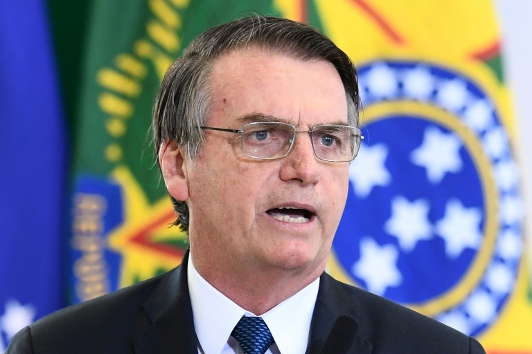 Caixa está na vanguarda da questão econômica, diminuindo juros, diz Bolsonaro